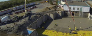 Overhead view of concrete pouring at a construction site